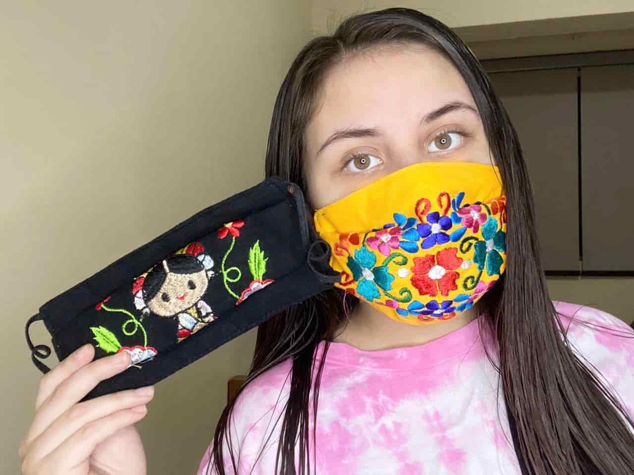 PrepaTec student wearing the face masks developed for her project.