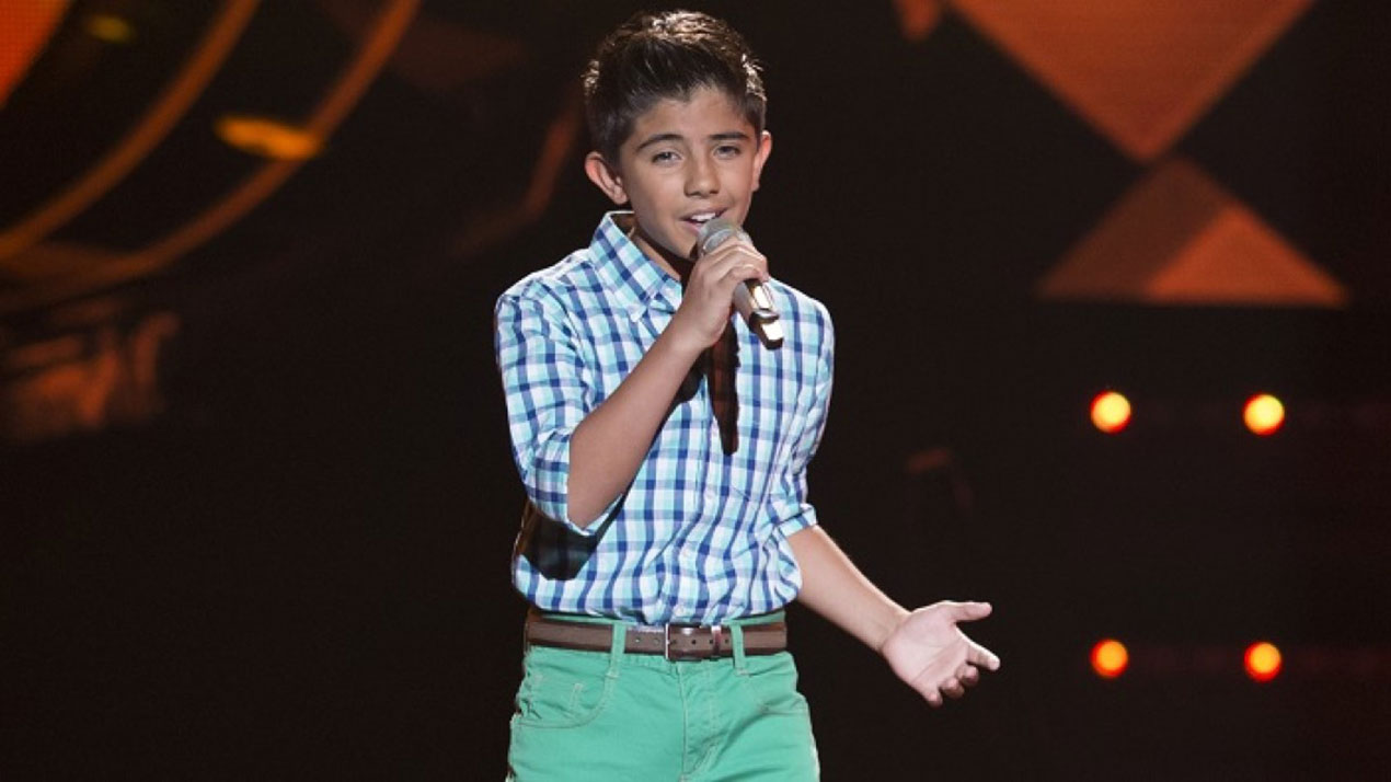 Oscar Aguilar participando en La Voz Kids