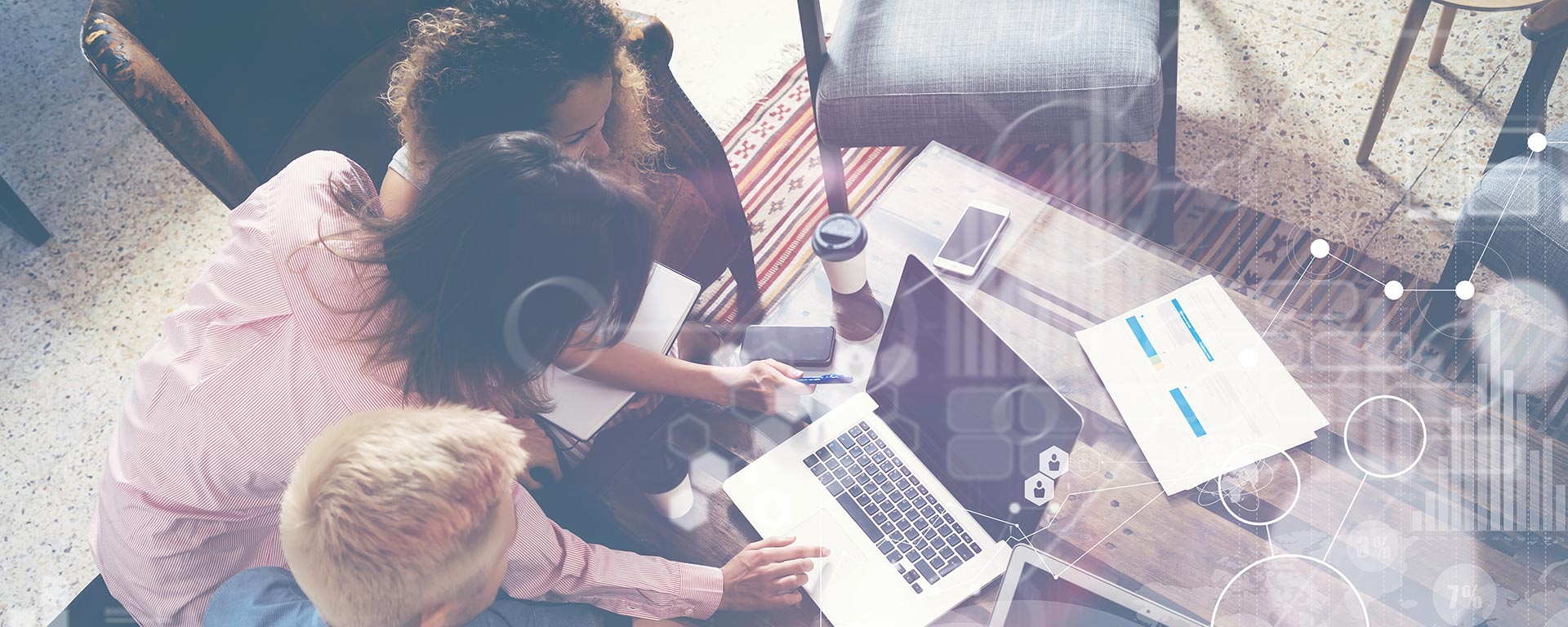 People gathered in a meeting room, actively participating in a collaborative work session.