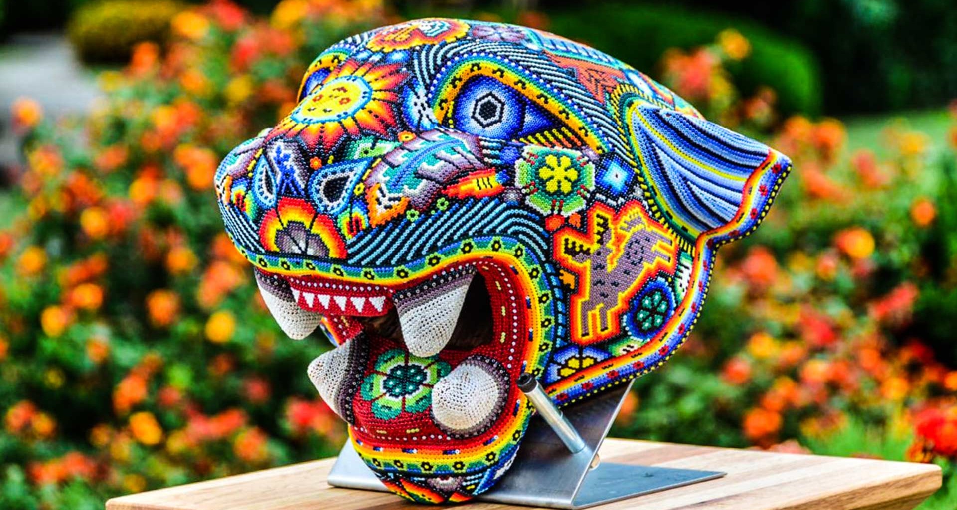 Cabezas de jaguar en Arte Huichol 