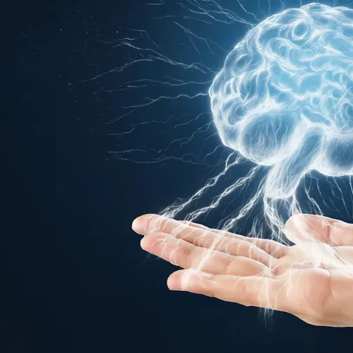 Outstretched hand holding a luminous, floating representation of a brain with simulated electrical connections.