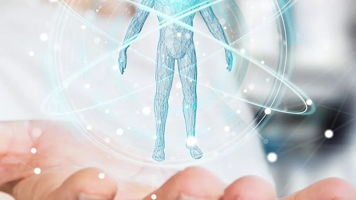 Hand holding a digital representation of the world and a human figure as a symbol of artificial intelligence.